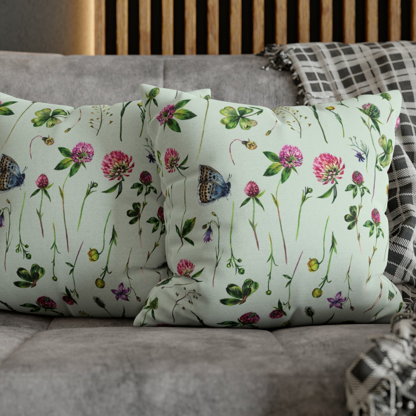 a couple of pillows sitting on top of a couch