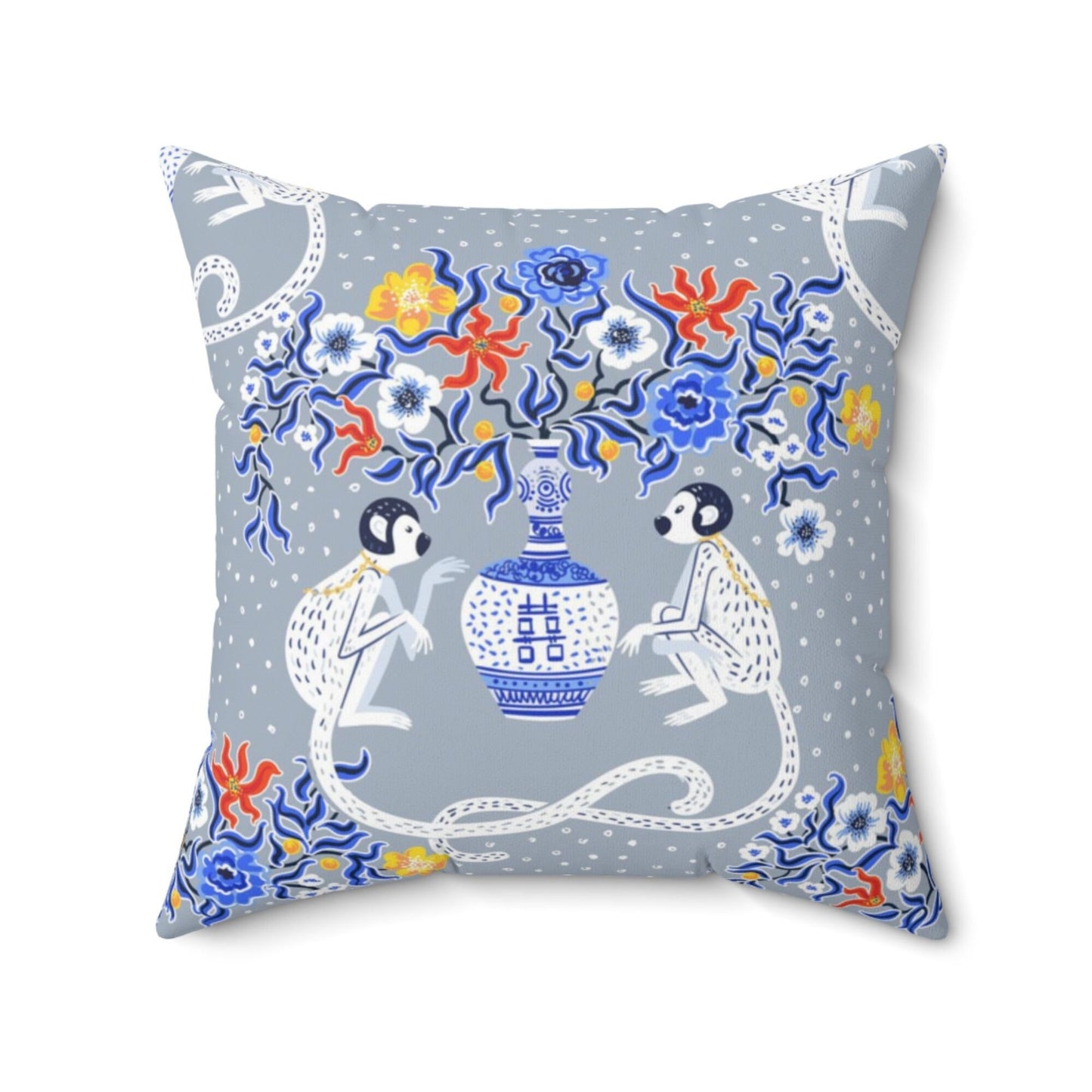 Chinoiserie monkey throw pillow with blue pagoda vase. Oriental design with floral accents.