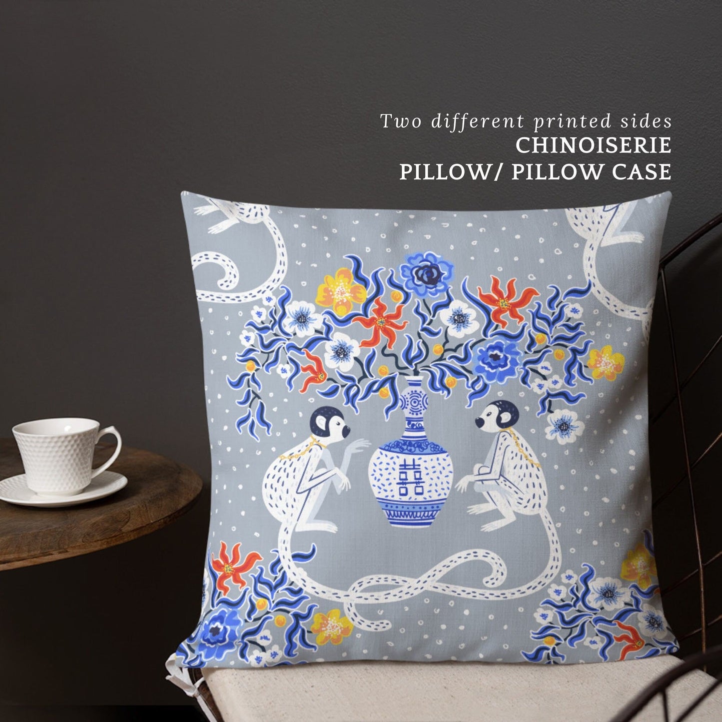 Chinoiserie pillow with monkey and floral design. Two different printed sides. Decorative throw pillow with oriental motif.