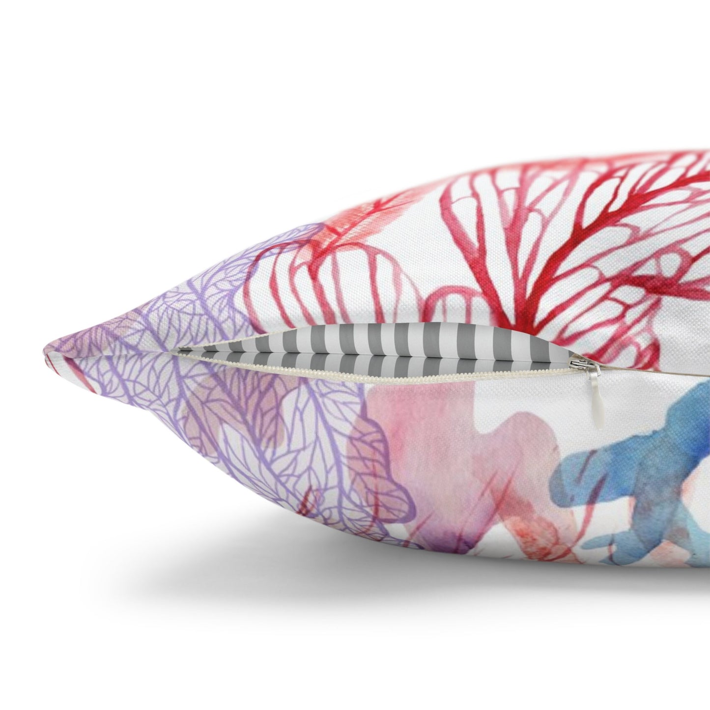 Coral reef pillow cover close-up with zipper. Coral and jellyfish design on beige fabric