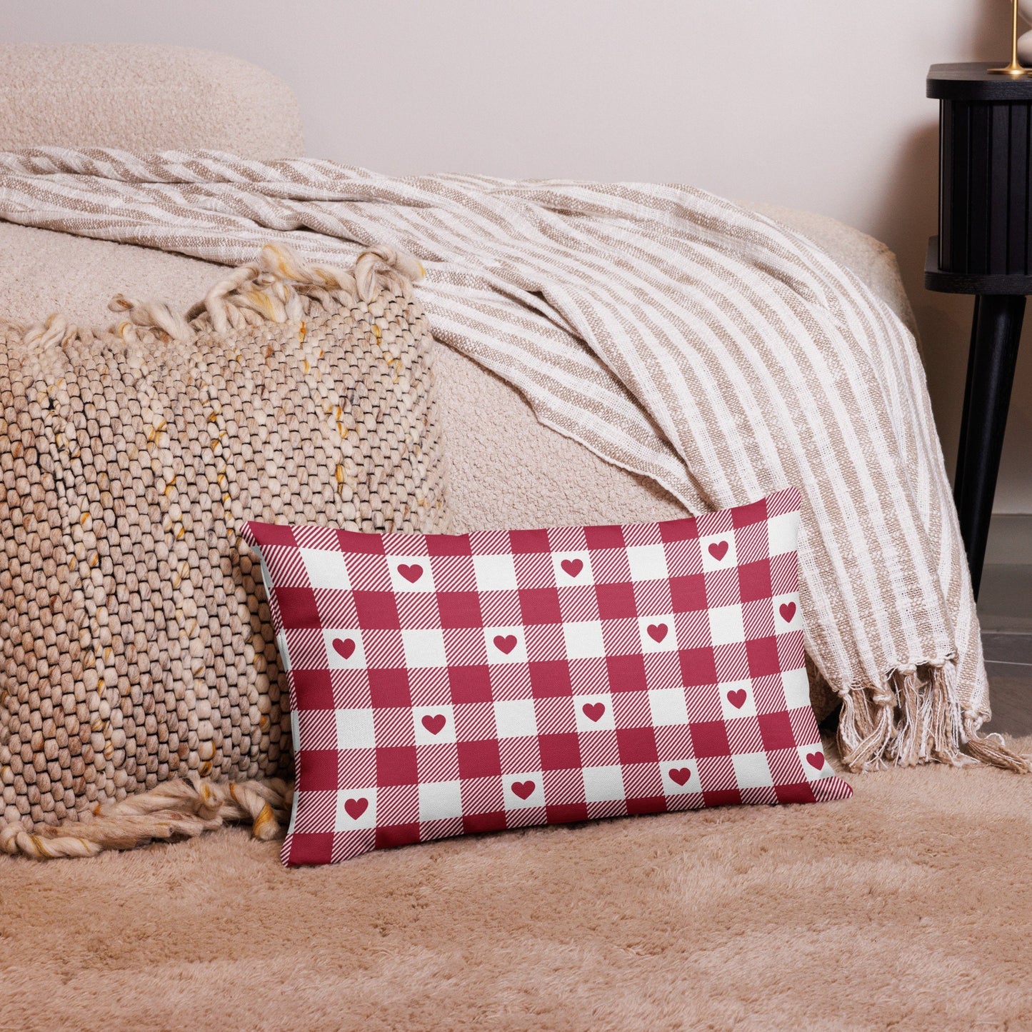 Valentine Pink Gingham Hearts PILLOW lumbar style on a beige couch – warm and cozy Valentine home styling