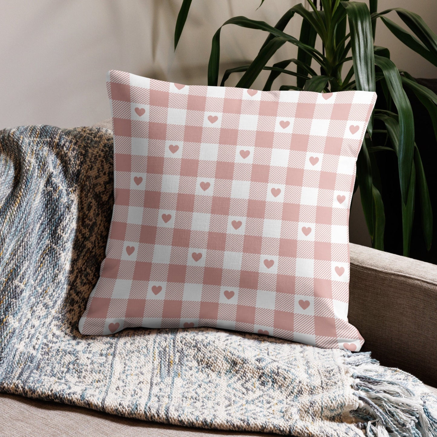 Light pink Valentine Pink Gingham Hearts PILLOW on a cozy sofa with textured blanket – romantic home décor