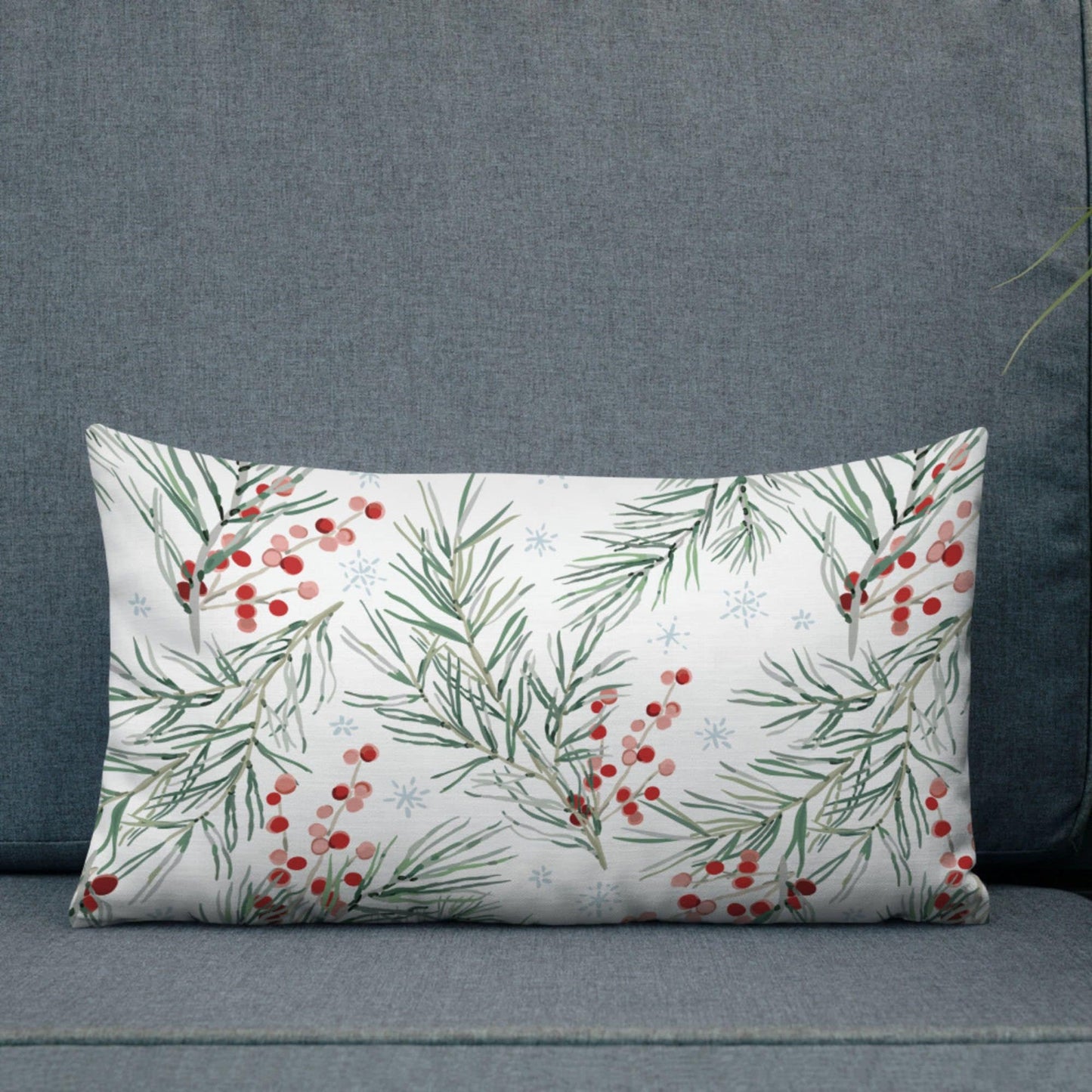 Winter Berry Botanical Christmas lumbar pillow from Blue Water Songs on grey sofa