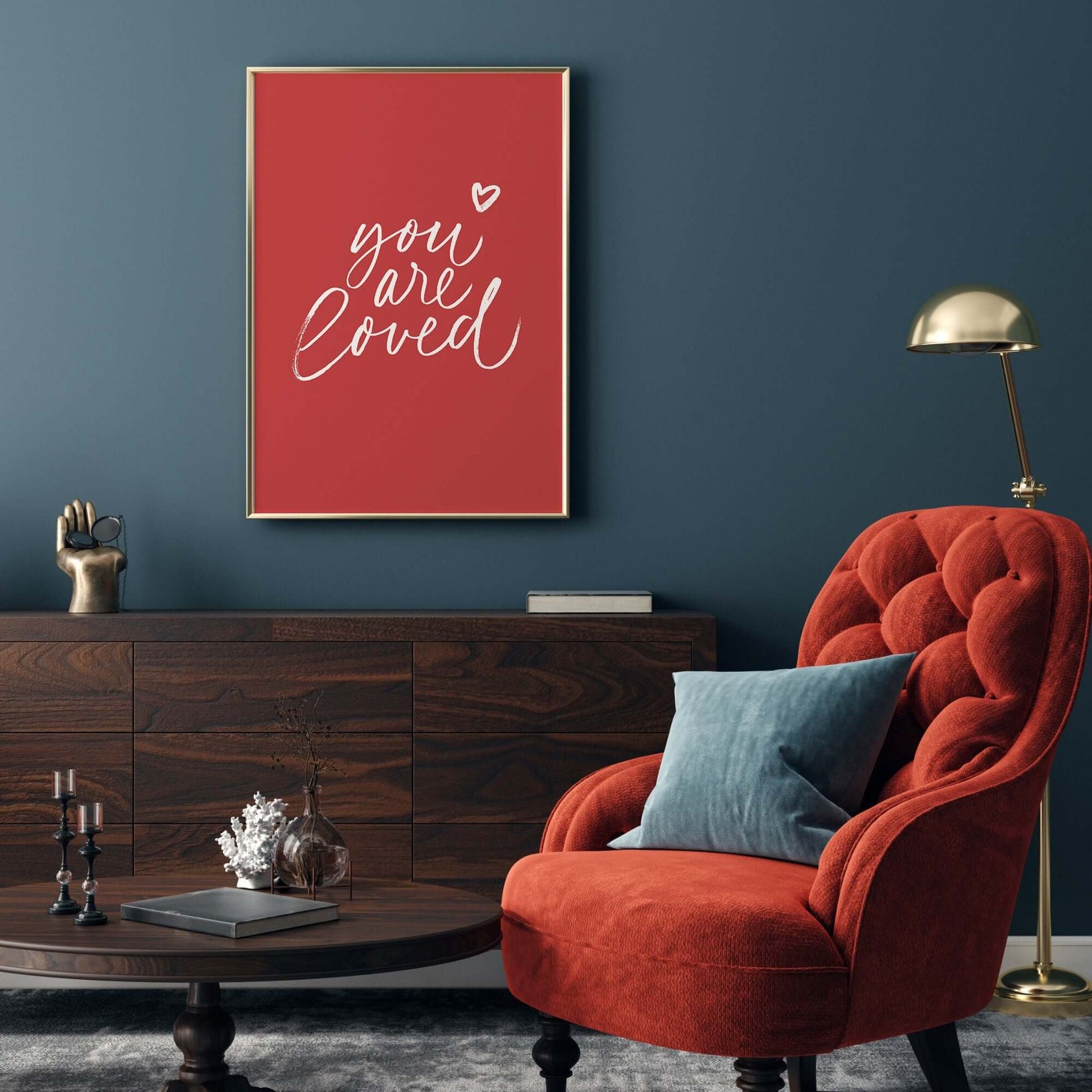 "You are loved" handwriting poster on the wall in the luxury living room with blue and red tone
